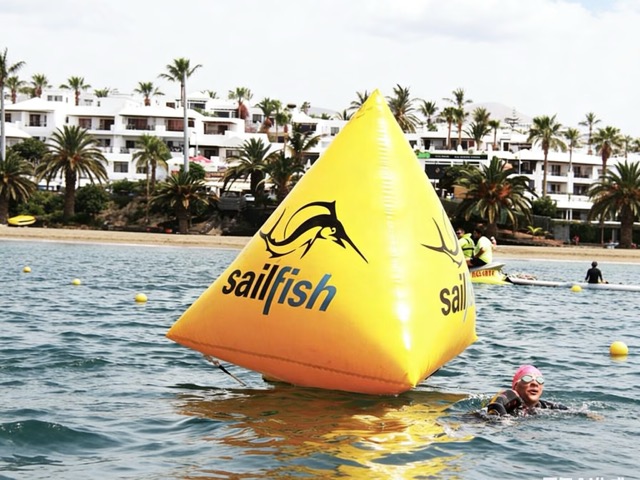 High-visibility yellow inflatable race buoy
