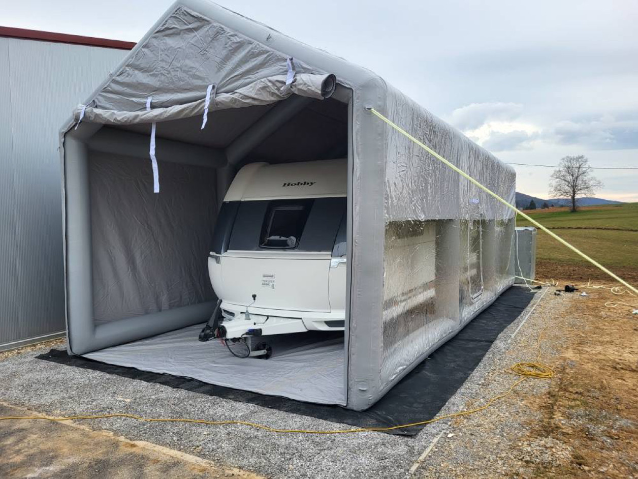 Vehicle fully protected by Inflatable Car Cover