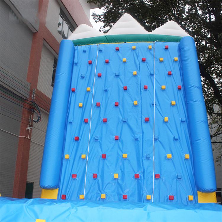 Professional inflatable climbing wall with grips