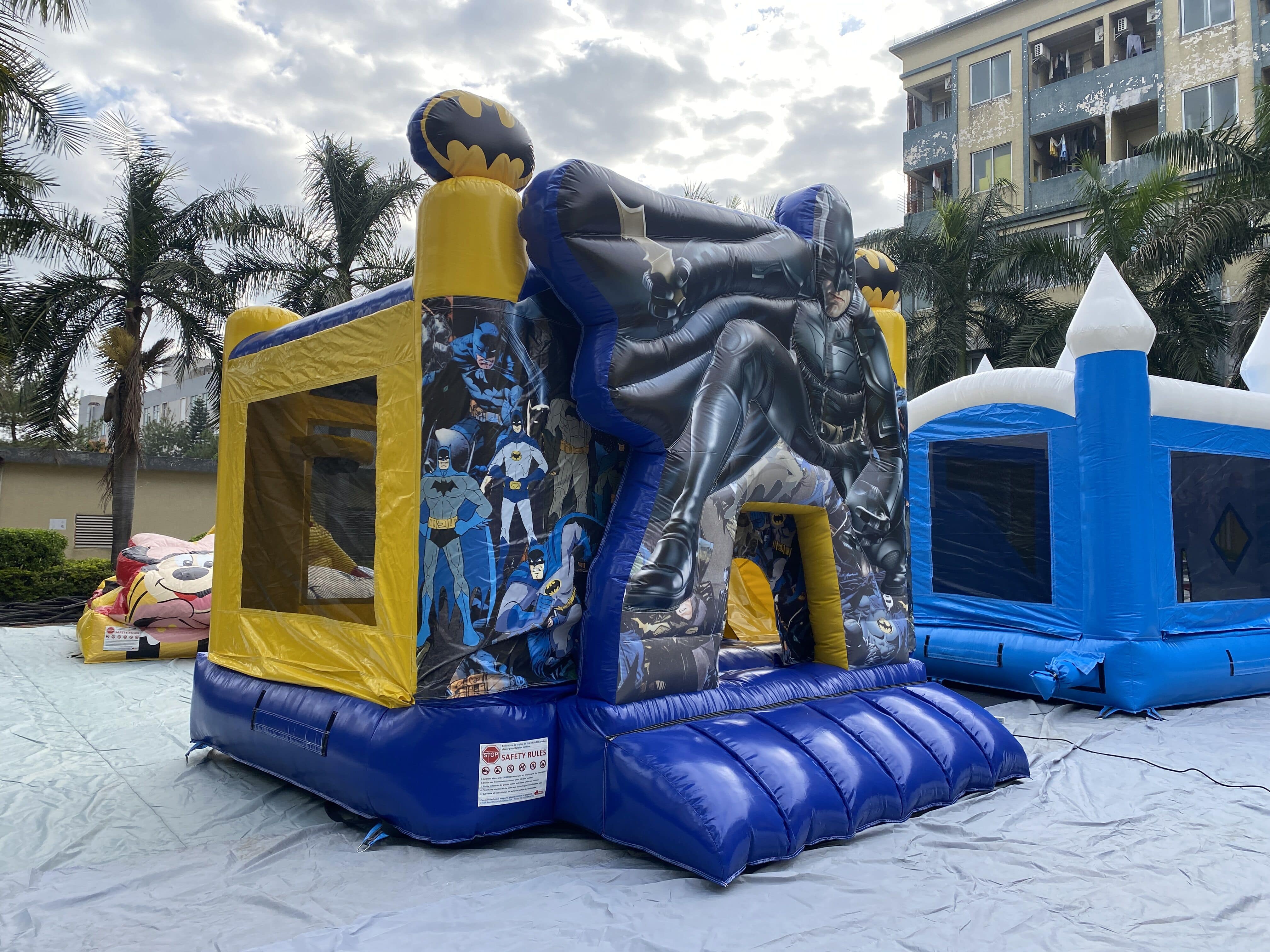 Kids superhero inflatable slide