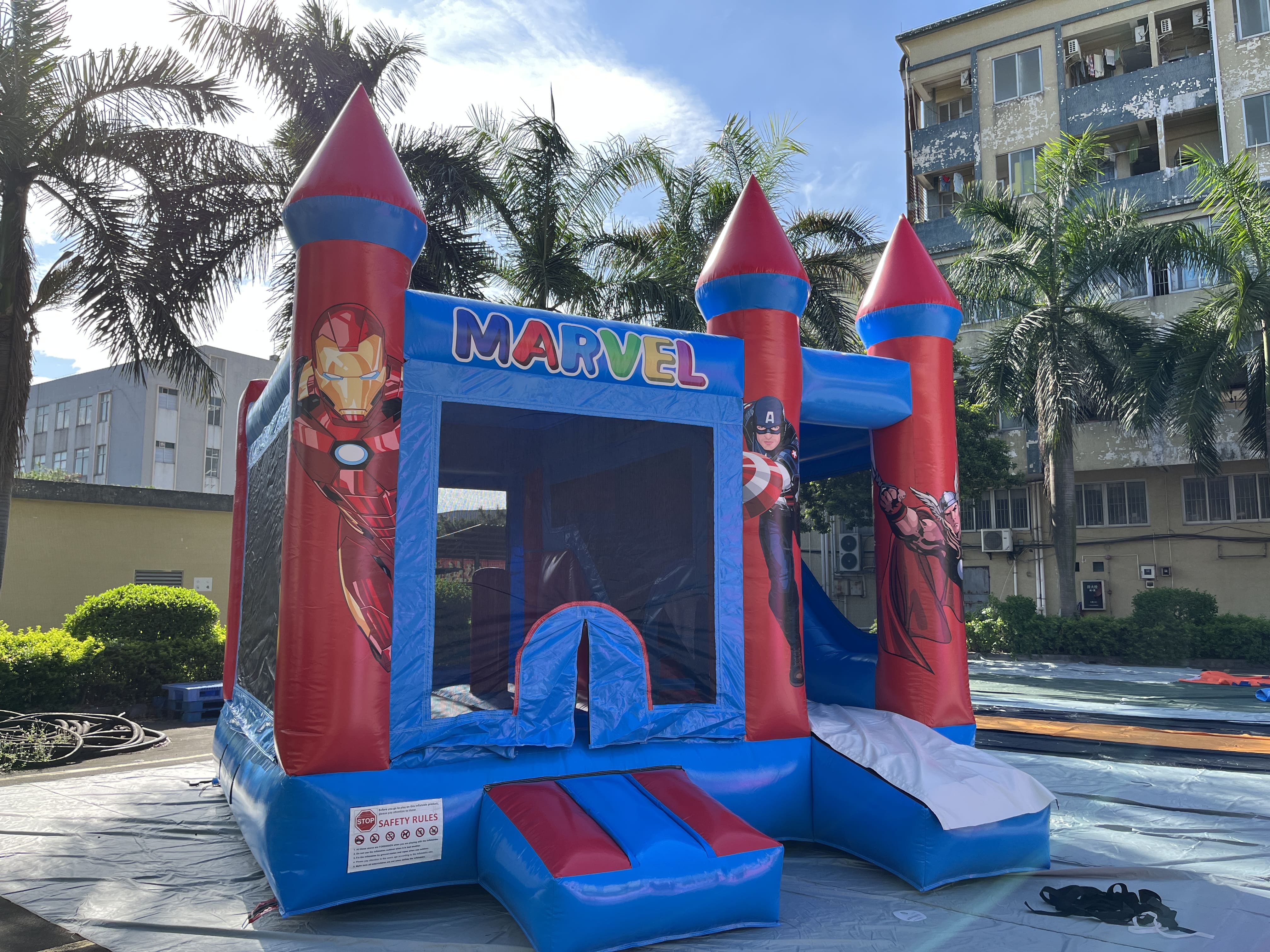 Kids superhero inflatable slide